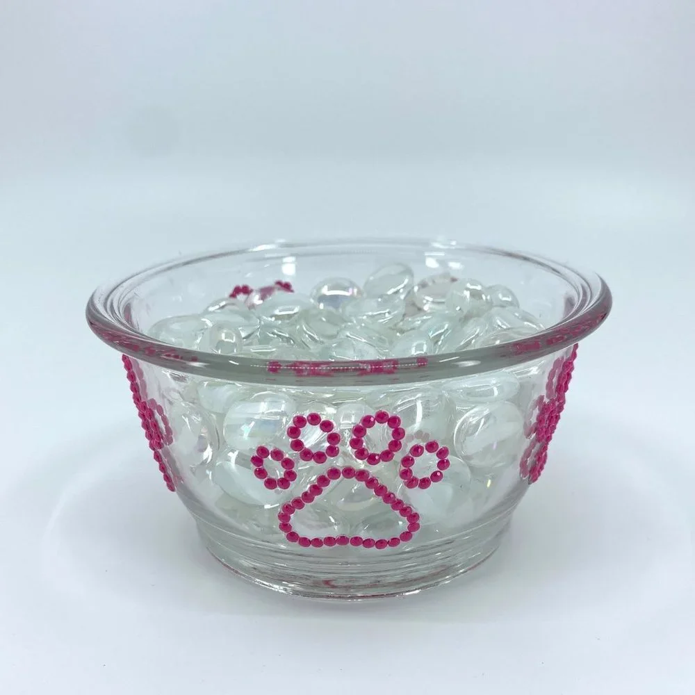 Dog, cat, pet small water, food glass bowl. Pink paws.
